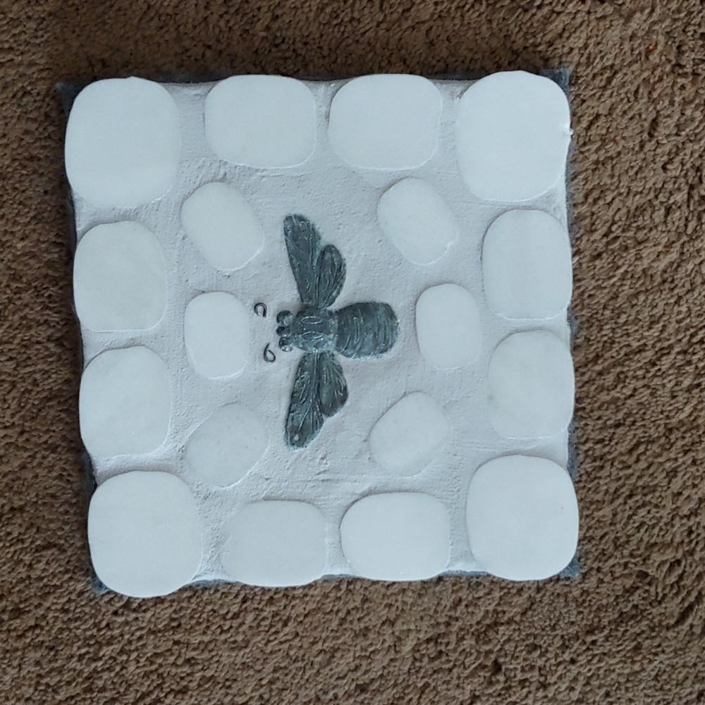 Handmade  butterfly hot pad with stone and grout and felted back